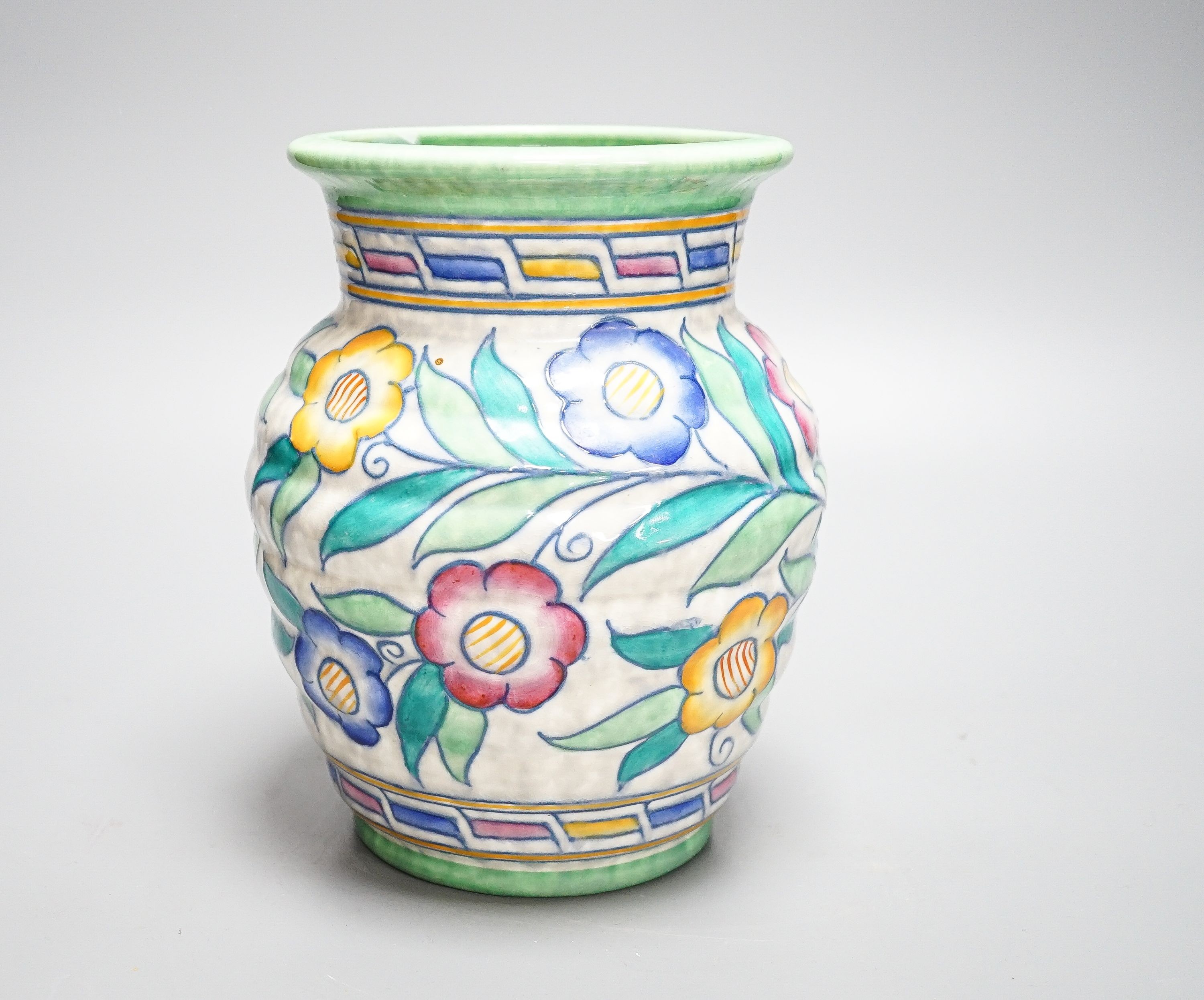 A Charlotte Rhead vase, painted with flowers in polychrome enamels, 20cm